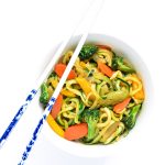 Easy Szechuan Veggie Zoodles - a vegetarian dish of zucchini noodles, tons of veggies, and a tasty Szechuan sauce. Super light and so yummy! | tastythin.com