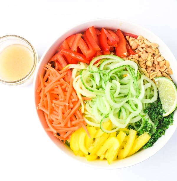 Spiralized Spring Roll Bowls - cucumber noodles, sweet Asian dressing, and all the flavors of Spring Rolls in a bowl. No rice paper rolling involved! | tastythin.com
