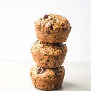 Zucchini Applesauce Muffins - these hearty muffins are light on calories and full of nutritious veggies and fruit. An excellent grab-and-go breakfast or snack | tastythin.com