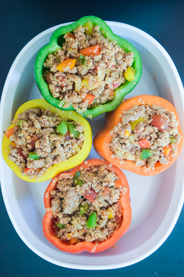 Taco Turkey Quinoa Stuffed Peppers - A healthy and delicious filling! This recipe makes 3 meals - 1 for tonight and 2 for the freezer! | tastythin.com