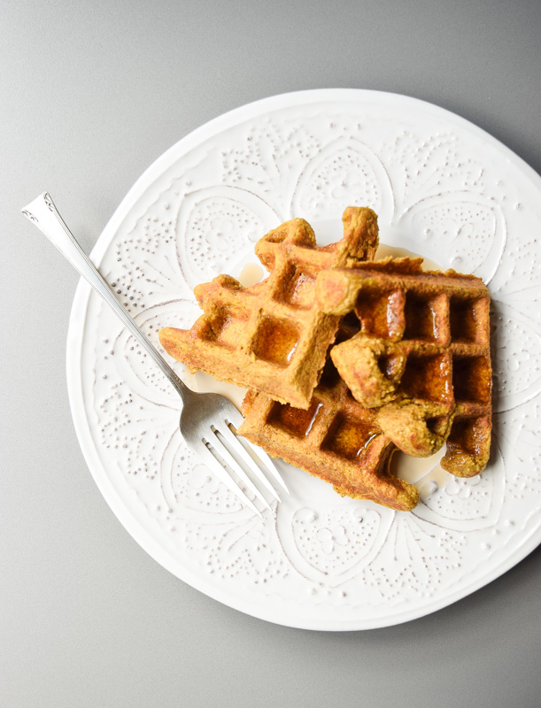 Pumpkin Oat Waffles - these gluten free, tasty waffles can be made ahead and frozen for a quick breakfast the whole family will love! | tastythin.com