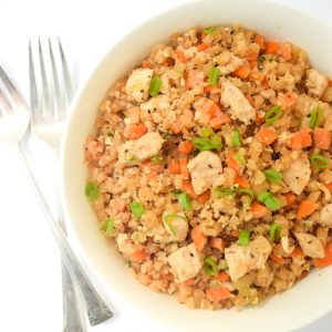 Whole30 Cauliflower Chicken Fried Rice - a fast, nutritious meal that tastes like take-out, but is free of soy and carbs! | tastythin.com