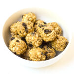 oatmeal raisin cookie protein balls in a bowl