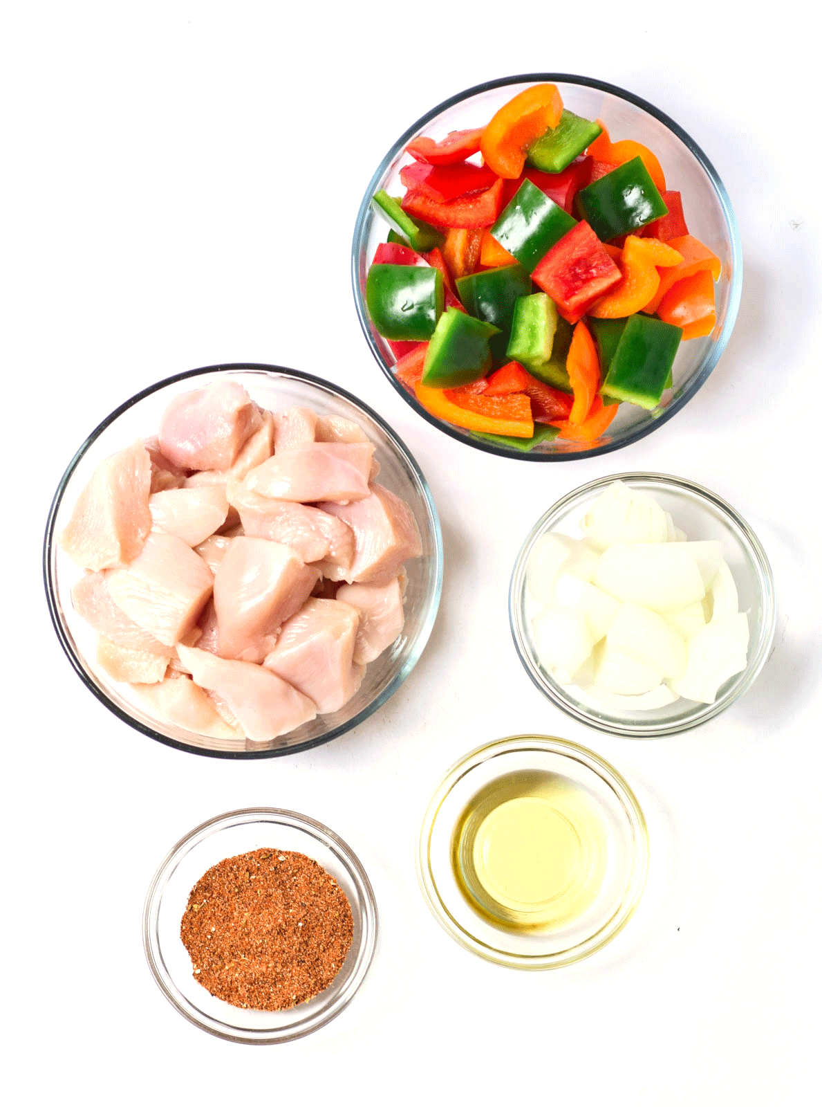 bowls of chicken fajita ingredients
