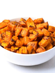 bowl filled with air fryer sweet potato cubes
