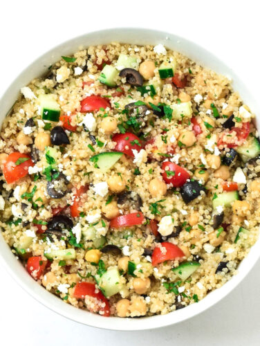 Greek quinoa salad with chickpeas in a large bowl