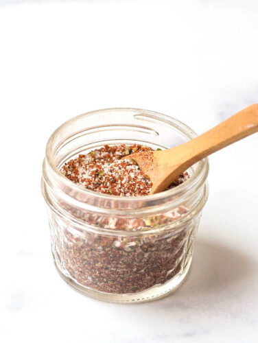 steak dry rub in a small mason jar with spoon