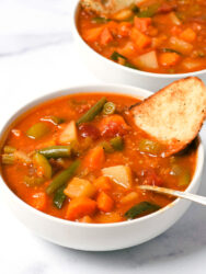 bow of instant pot vegetable stew with crusty bread