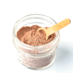 chicken wing dry rub in a small mason jar with spoon
