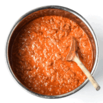 hearty bolognese meat sauce in instant pot with wooden spoon