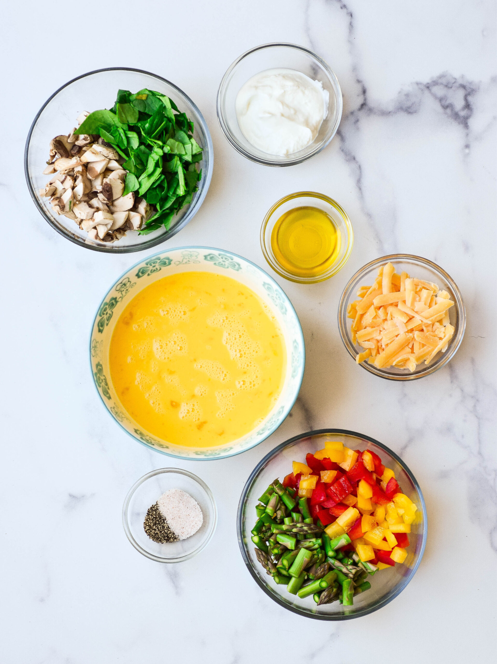 ingredients for healthy vegetable frittata in bowls