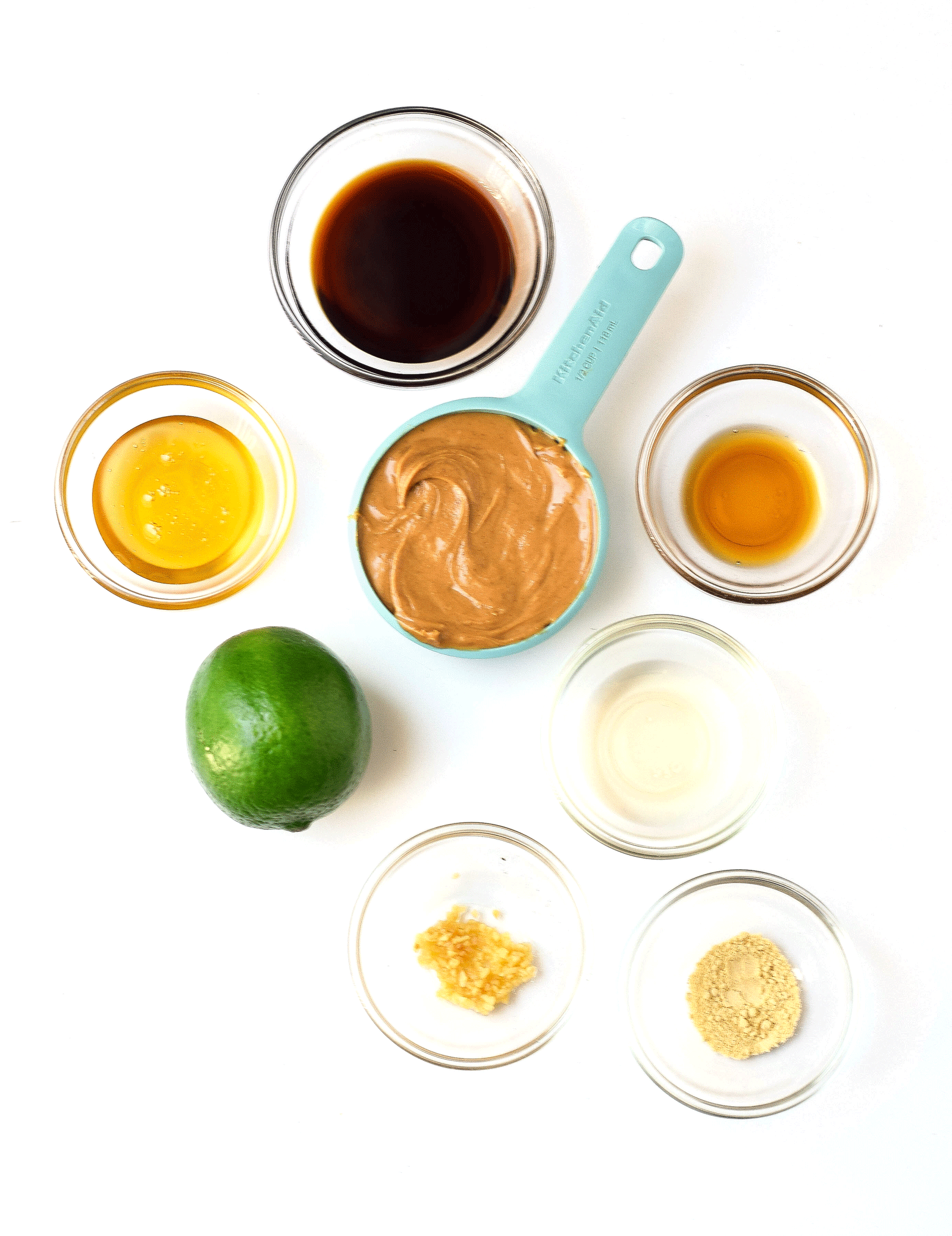 ingredients in small bowls for thai peanut dressing